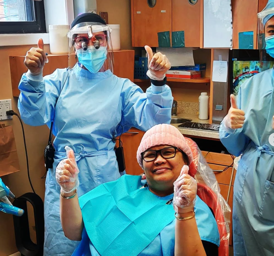 happy patient at our dental clinic in little italy, on